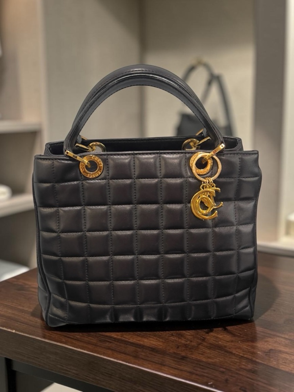 COSCI Italy quilted leather handbag with gold-tone hardware and a 'C' charm